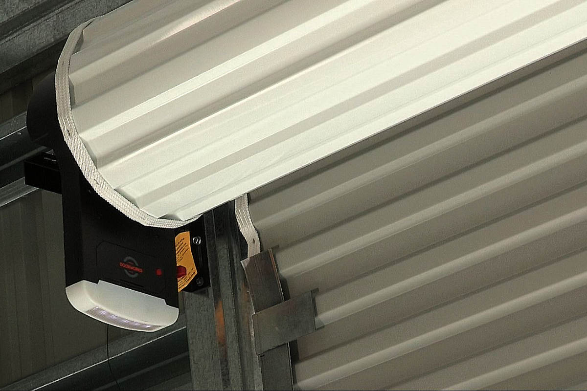 automatic roller door opener for shed Automatic roller door opener installed in a New Zealand shed
