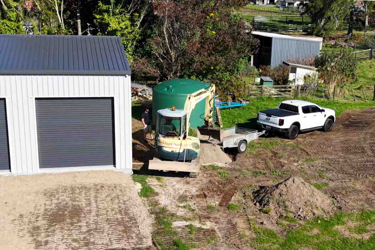 project management on site shed construction Shed construction project with builder and equipment on site