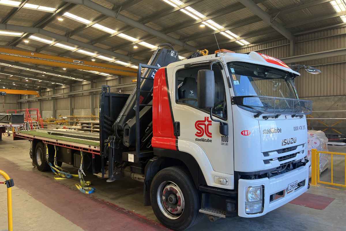 steel shed kit loaded on hiab delivery truck Steel shed kit loaded onto Hiab delivery truck