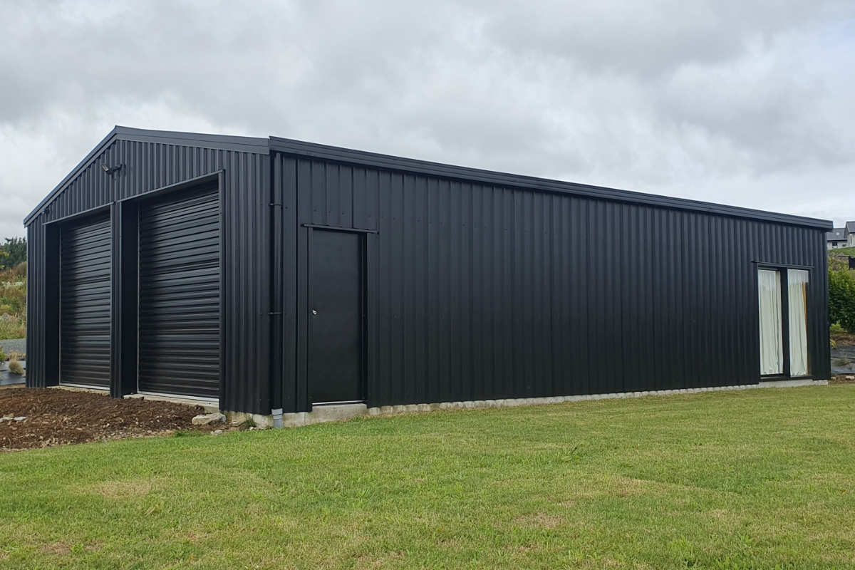 two bay garage with integrated utility space Modern two-bay garage with integrated utility space